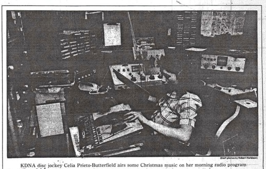 KDNA disc jockey Celia Prieto-Butterfield airs some Christmas music on her morning radio program. Yakima Herald Republic, 17 December 1984.